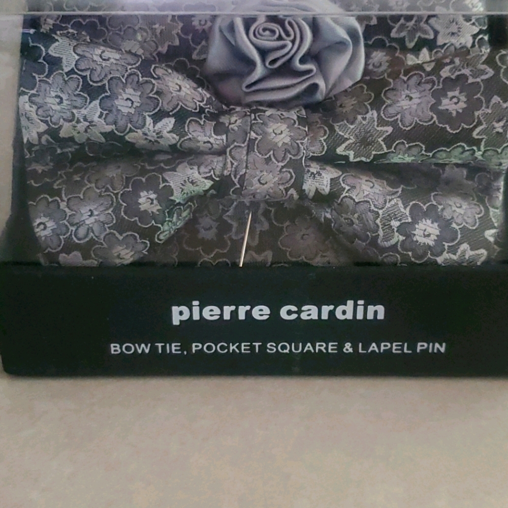 Bow tie, pocket square and lapel pin